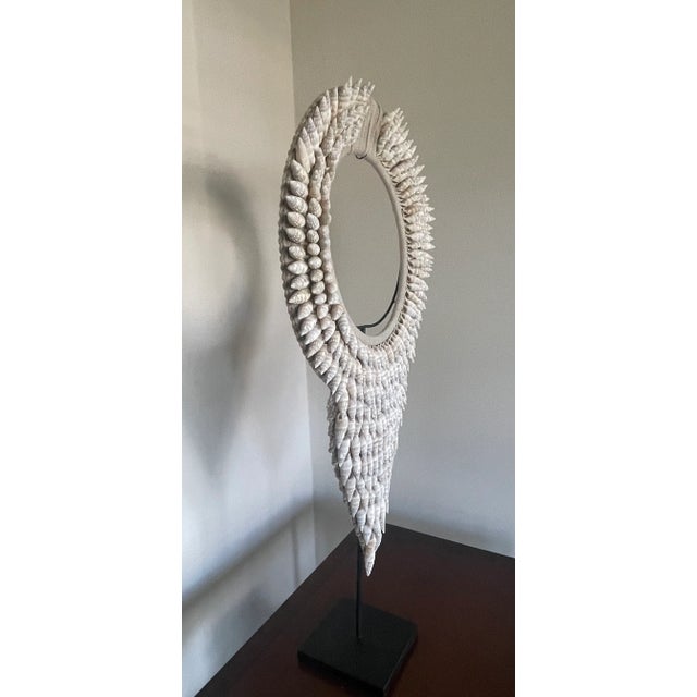 African Shell Necklace on Stand. A beautiful sculptural piece.