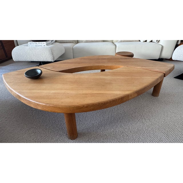 This table has a beautiful patina and is one of the most renowned and sought-after designs by Pierre Chapo. It is made of...
