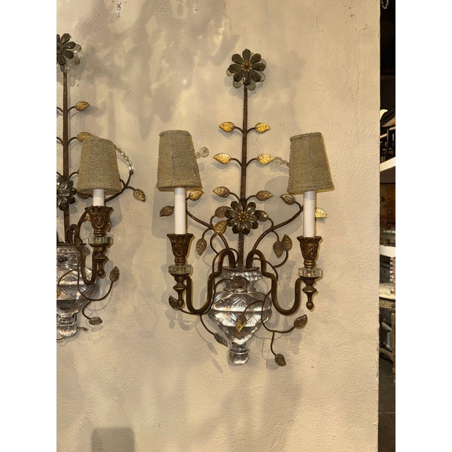 The Pair of Italian Banci Firenze Bagues Style Sconces are elegant and stylish lighting fixtures perfect for adding a...