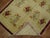 One of a kind, mid-20th century ivory field Turkish floral rug.