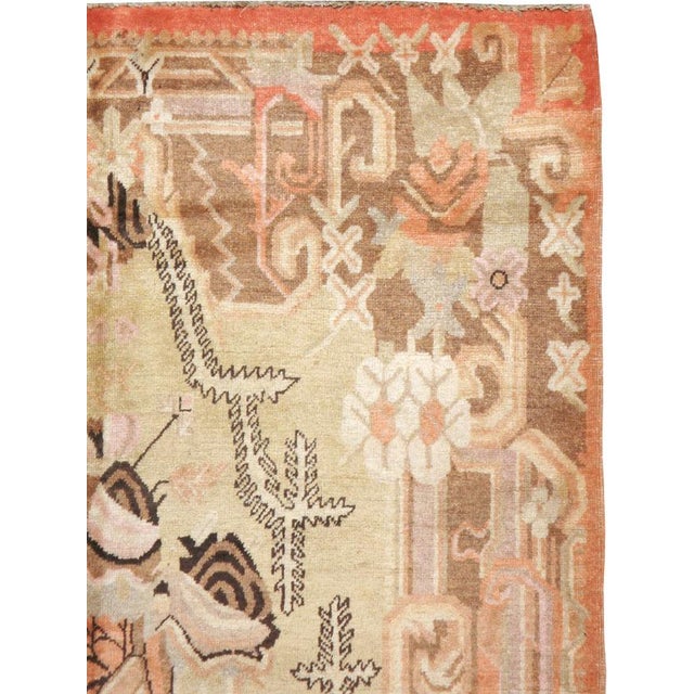 Antique Khotan rugs and carpets were produced in the oasis town of Eastern Turkestan, today part of the Xinjiang region in...