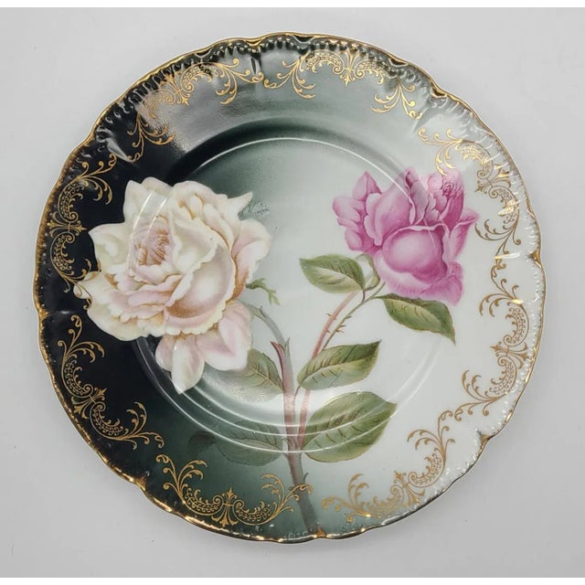 This is an antique hand painted decorative plate by Rosenthal, produced during the transitional period between the...