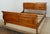 California King Bed by Ethan Allen. Store item #541. I features solid wood construction and comes with slats.