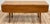 Vintage Ethan Allen natural maple wood drop leaf dining table featuring two rounded edge narrow attached leaves and four...