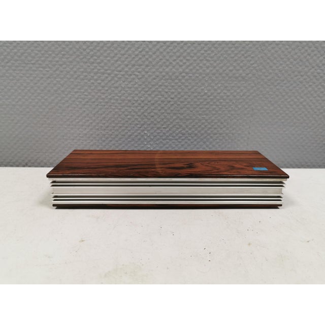 Incredibly beautiful box/case for cigars/cigarillos/cigarettes, etc. Made of rosewood and aluminium with light blue enamel...