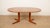 This stylish vintage round dining table from Denmark is made of warm teak and features a practical extendable design. When...