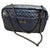 This is a iconic limited edition Chanel shoulder bag, featuring a beautiful deep blue metallic quilted leather finish with...
