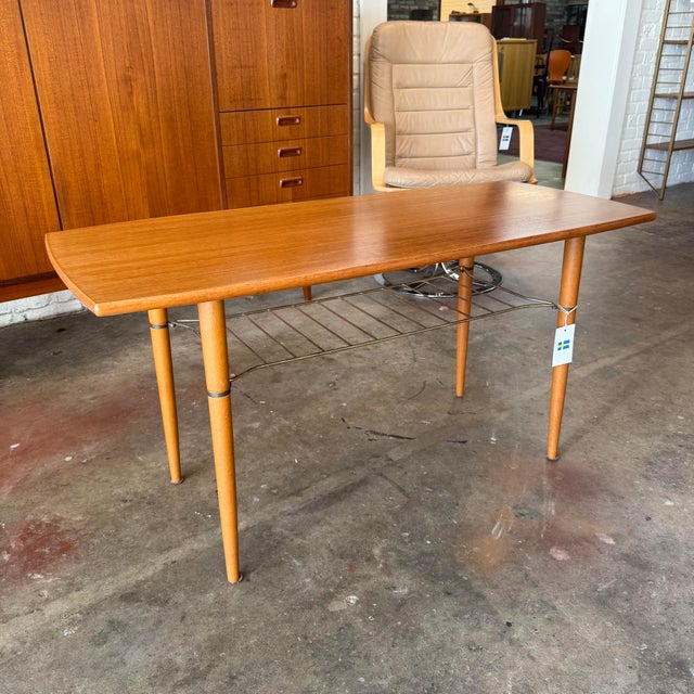 Vintage mid-century modern two-tier coffee or cocktail table in teak and beech Attributed to Alberts Tibro, Sweden....