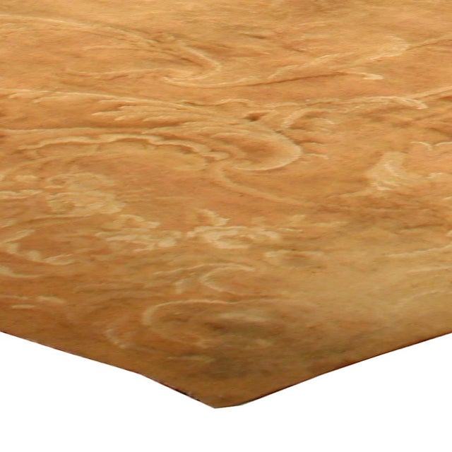 This distinguished 1920s antique French Savonnerie rug exemplifies the elegance and craftsmanship synonymous with the...