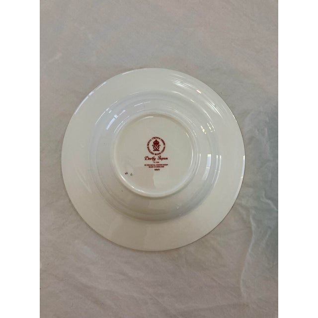 Rimmed soup bowl in the classic Imari design pattern "Derby Japan" A 1336 by Royal Crown Derby. Fine English bone china...