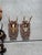 A sculptural collection of ten vintage European roe deer antler mounts, each set on hand-carved wooden plaques with...