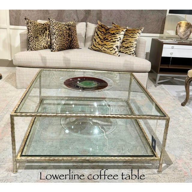 Handsome hammered iron hand painted in Aged Silver Leaf finish- 2 shelves 1/2 " clear glass make it possible to display...