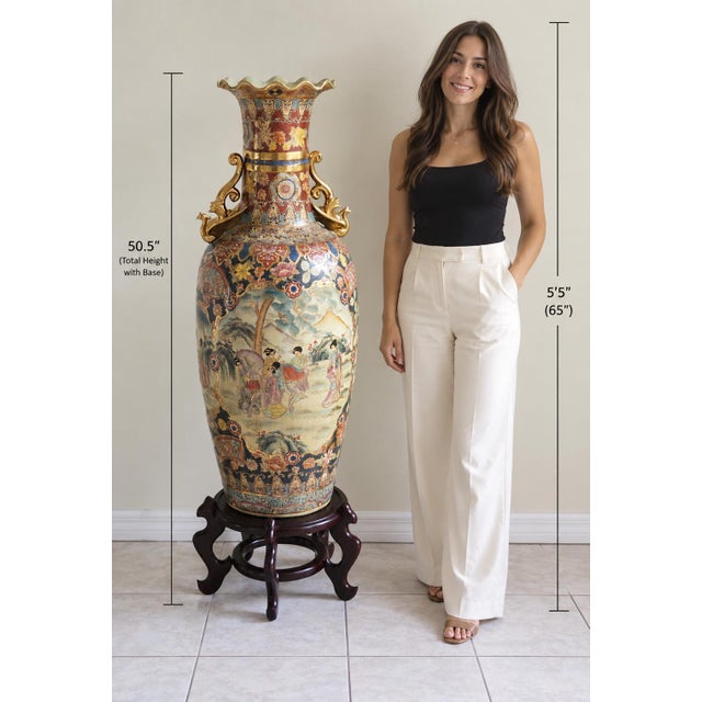 This magnificent Chinese Export Royal Satsuma-style palace vase stands an impressive 50.5 inches tall with its matching...