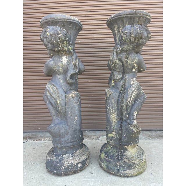 Make a grand architectural statement with this impressive pair of vintage cast stone (concrete) planters. Rescued from a...
