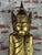 Large wooden sculpture of a MANDALAY BUDDHA from Burma 1970 in patinated gilded wood, inlay with red pearls. 1 old...