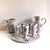 A beautifully coordinated vintage French pottery serving set by La Roue Vallauris, featuring hand-painted blue floral...