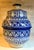 Antique Moroccan Fassi pottery jar featuring intricate, hand-painted geometric and floral designs. Excellent Condition...
