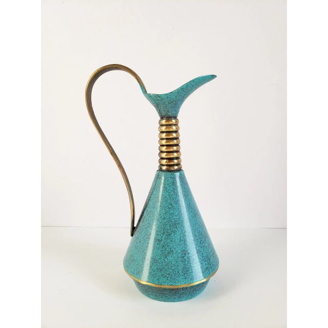 Vintage Mid-Century made in Israel handcrafted turquoise enamel and brass trims decorative decanter. This decanter has...