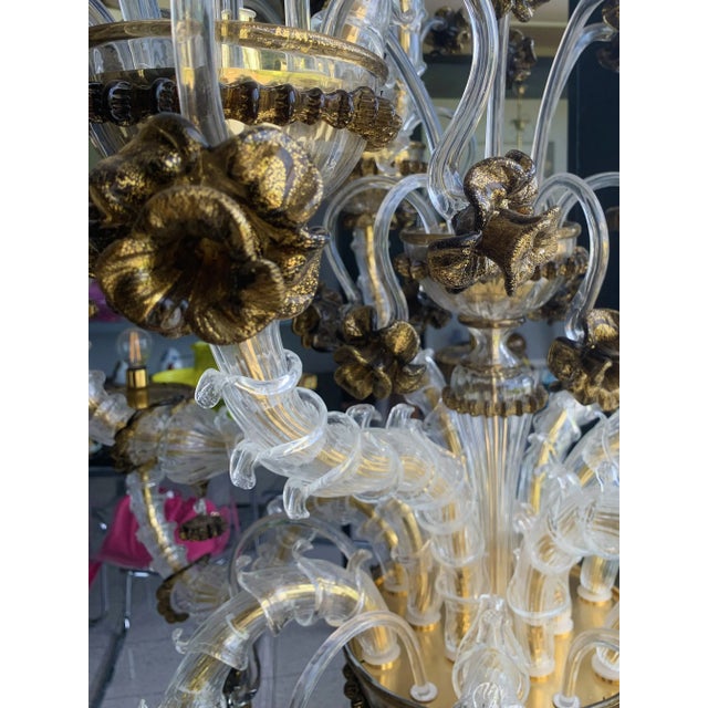 Ca' Rezzonico classical chandelier made in Murano glass. Very particoular and floreal design , impressive piece of art....