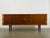 Hans J Wegner teak tambour door "President" credenza. Manufactured by RY Mobler, Denmark circa 1965. This piece has been...