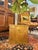 This large-scale vintage brass jardinière or cachepot dates to approximately the 1970s. Constructed in an architectural...