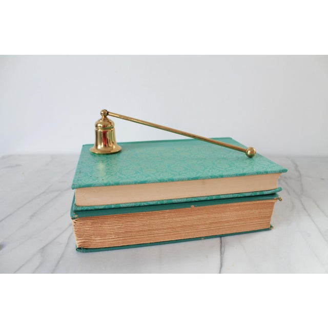 Vintage brass candle snuffer. No makers mark. Some signs of age wear and use.