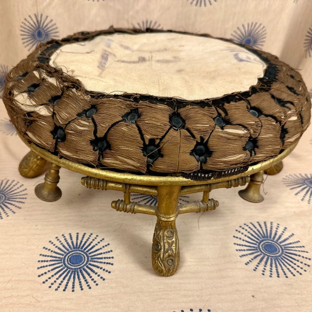 English Chinese Chippendale style gilded faux bamboo stool from the mid-19th century. Remains of vintage (original?)...