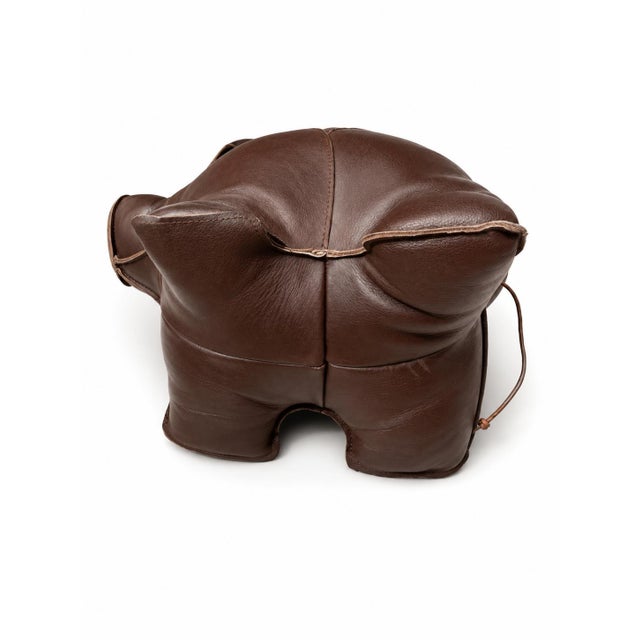 A brown cowhide leather animal figurine: a handcrafted leather pig by Omersa. Dimitri Omersa (1927–1985) was one of the...