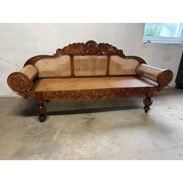 Vintage British Colonial West Style Indies Cedrela and Caned Settee Handcrafted with ocean inspired motifs, rolled arms...