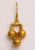 A pair of 18K gold South Indian dangle drop earrings hand-tooled testured design using the lost wax method. French wire...