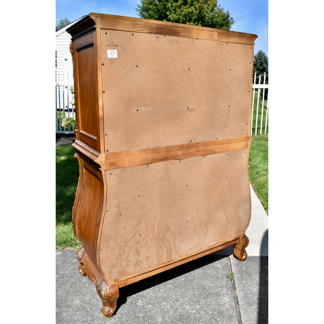 Vintage (1990's) Bombe' Tall Chest has a French Style. The Brand: Legacy Furniture. The Wood is Distressed Pine. Craved...