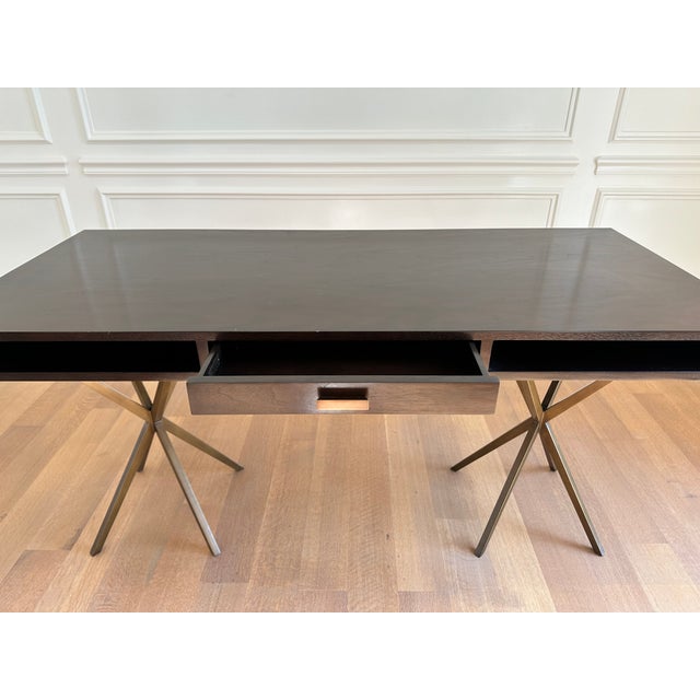 Elevate your workspace with this chic and sculptural desk from luxury British brand Mr. Brown London. Featuring a sleek...