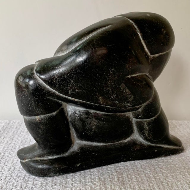 Inuit Soapstone Carving by Lucassie Amm – Signed - Kneeling Inuk Figure For Sale - Image 12 of 18