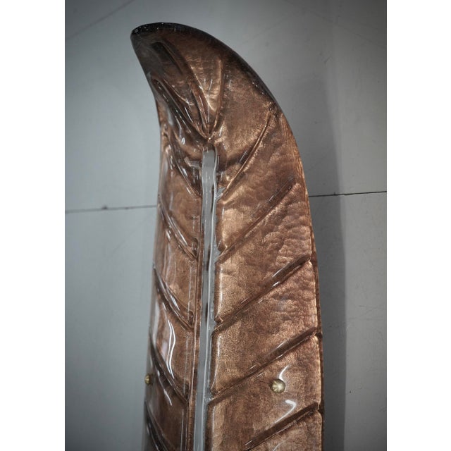Beautiful design for this leaf-shaped applique, all bronze with a vertical white rib. Refinement and class as in the...
