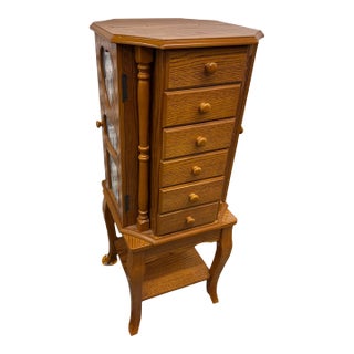 1960s Mid Century Revolving Jewelry Armoire in Oak Finish Free Standing Pilasters Mirror Chest of Draws For Sale