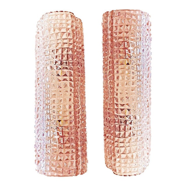 Set of two Organic style wall sconces in Murano glass. Scenographic pink color for italian luxury sconces. Luxury and...