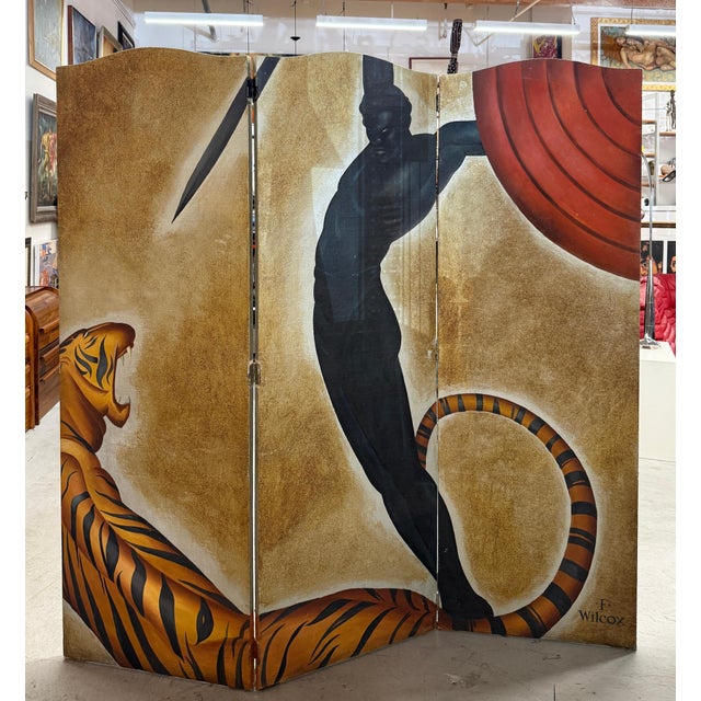 A wonderful mid century screen depicting a Tiger and a Warrior after a famous art deco work by Major Felton. This hand...