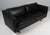 Erik Jørgensen three-seat original upholstered with black leather Legs of aluminium. Made by Erik Jørgensen. This piece is...