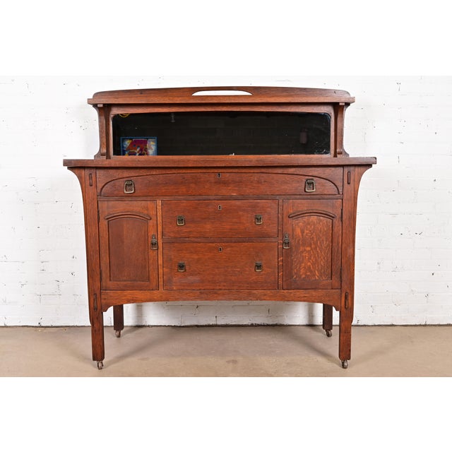 An exceptional antique Mission or Arts & Crafts period sideboard, or buffet server, or bar cabinet In the Manner of...
