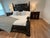 Grand Philippe Langdon Versailles California King bedroom ensemble, featuring the dramatic Versailles bed accompanied by a...