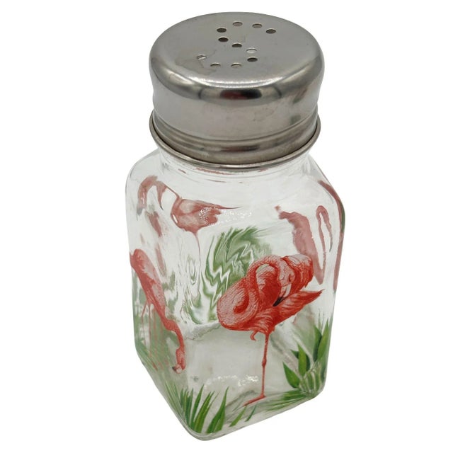Hand-painted clear glass Salt and Pepper Set with Pink Flamingos scenic along the front by Michel Design Works . Each...