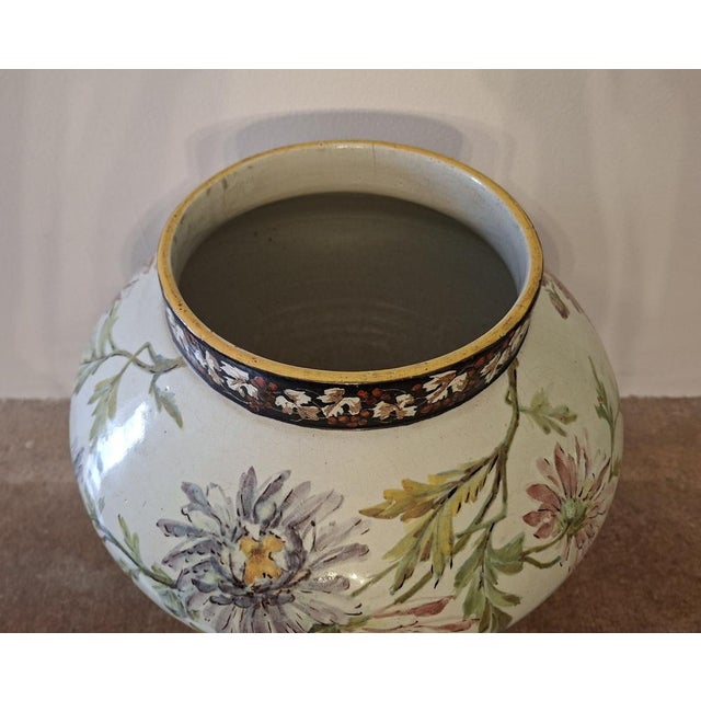 Large 20th Century Polychrome Earthenware Cachepot with Floral Decoration Resting on Three Panthers, 1920s, in Good...