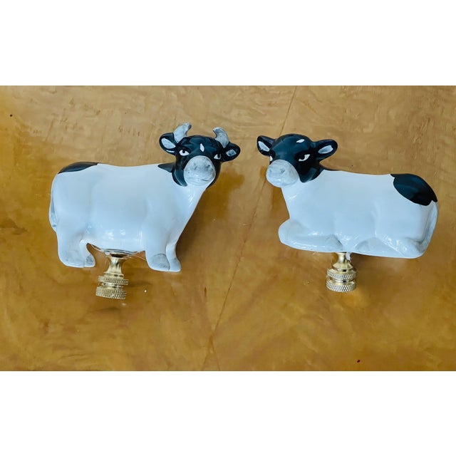 Cute pair of ceramic cows figurines lamp finials made of vintage salt and pepper shakers.