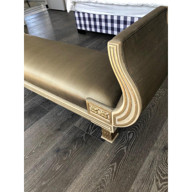 Neoclassical painted and parcel gilt settes benche,first quarter 20th century Each settee with scrolled fluted arms above...