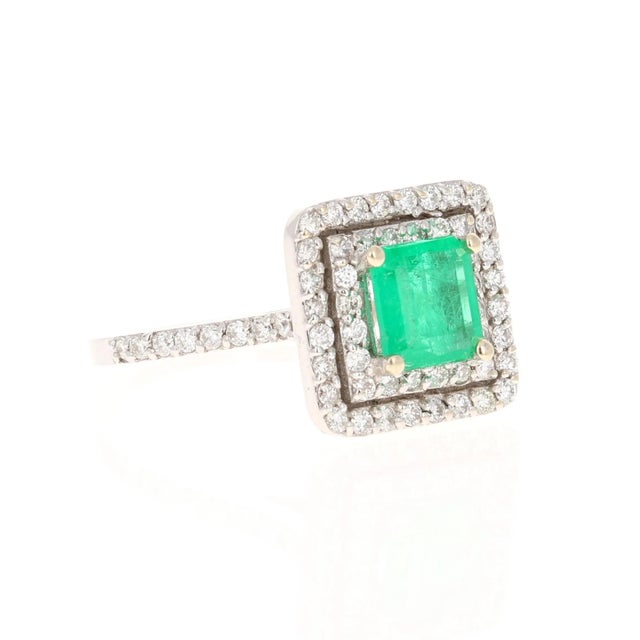 Exquisite Square-Emerald Cut Emerald Diamond Ring! The center is an Square Step Cut Emerald which weighs 0.93 Carats and...