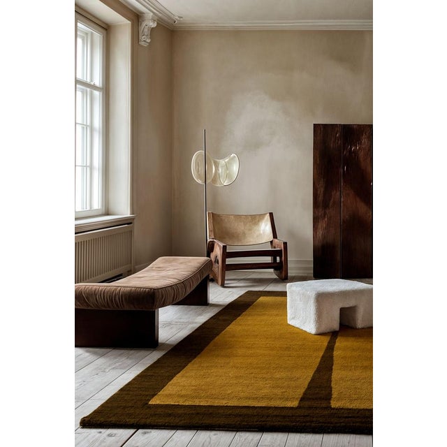 The Tobacco Rug evokes tobacco’s intense, rich fragrance, making a bold statement of luxury and depth. Its design captures...