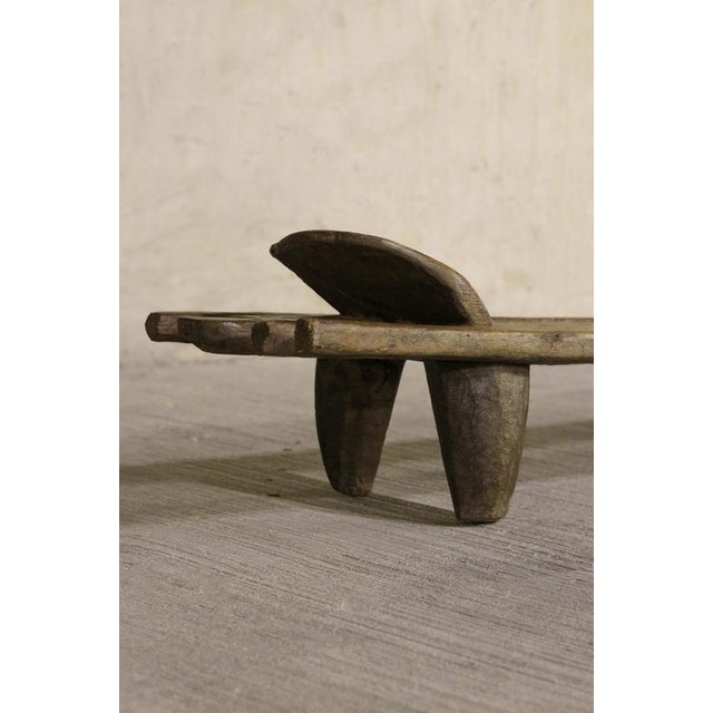 This hand-carved Senufo bed is an extraordinary piece rooted in the artistic heritage of the Senufo people of West Africa,...