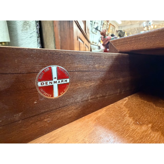 An exceptional vintage Danish Modern teak nightstand (or bedside chest) manufactured in Denmark and imported during the...
