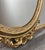 Metal Vintage French Ornate Oval Wall Mirror with Gold Finish For Sale - Image 7 of 10