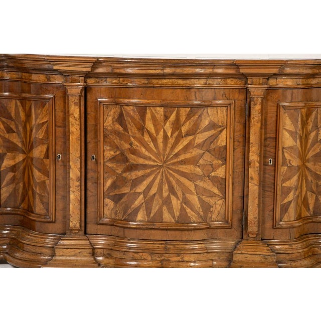 An Extraordinary, 19th Century Italian Walnut Side Cabinet. Of serpentine form, this lovely side cabinet was made in Italy...